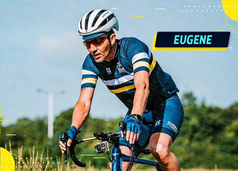 A man riding a bike with the words eugene.
